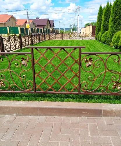 Забор созданный художественной ковкой